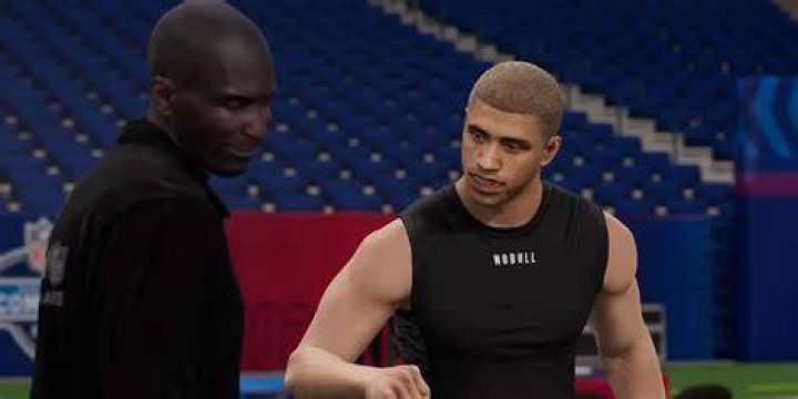 A custom made character talking with his coach in Madden 24 Superstar mode. 