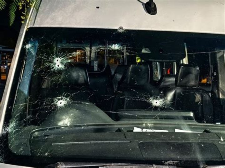 A vehicle riddled with bullets lies overturned on a street in Jesus Maria, Mexico. Photo / AP