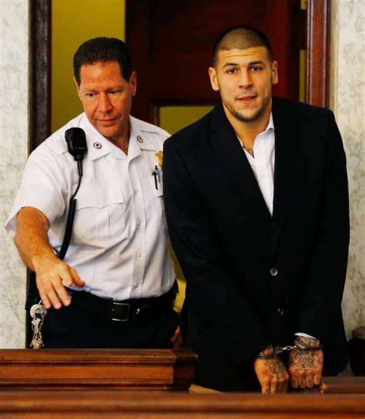 Aaron Hernandez is escorted into the courtroom of the Attleboro District Court for his hearing on August 22, 2013 in North Attleboro, Massachusetts. Photo / Getty