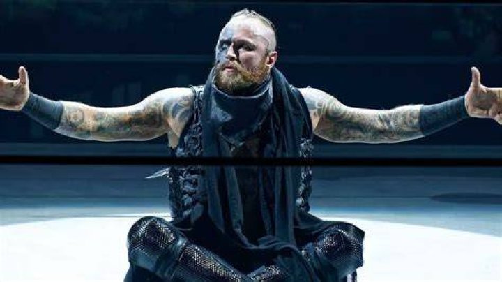 Aleister Black sitting in ring in WWE