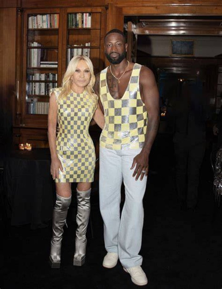 Allegra Beck (left) with heruncle Gianni Versace in 1995. Photo / Getty