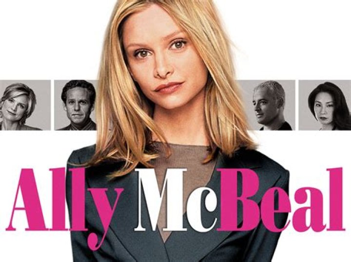 Ally McBeal cast photo of the smiling actors.