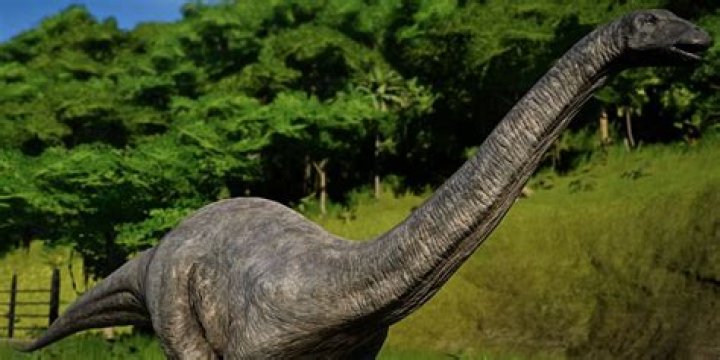 An Apatosaurus outside in Jurassic World Evolution
