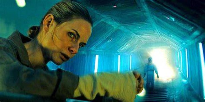An image of Rebecca Ferguson looking down a tunnel in Silo