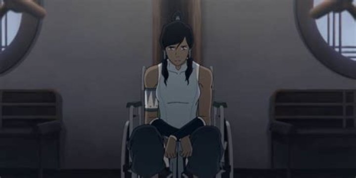 An upset Korra sits in a chair