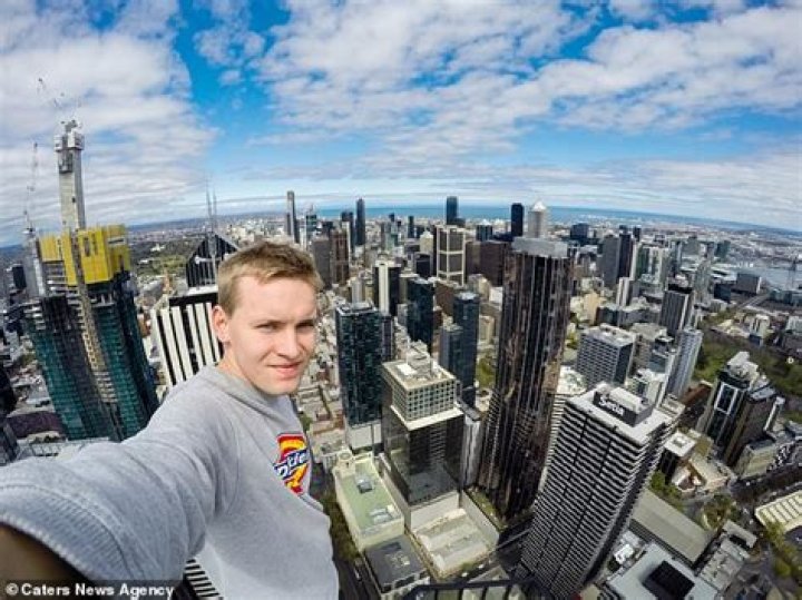 Andrej Ciesielski, 21, has been banned from Egypt, Japan and thanks to his latest stunt, he can add Australia to the list. Photo / @andrejcie / Caters News / AP