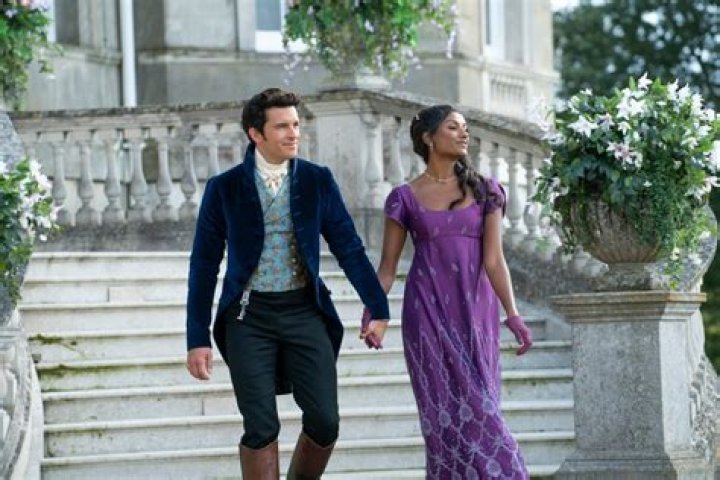 Anthony and Kate walking across a courtyard