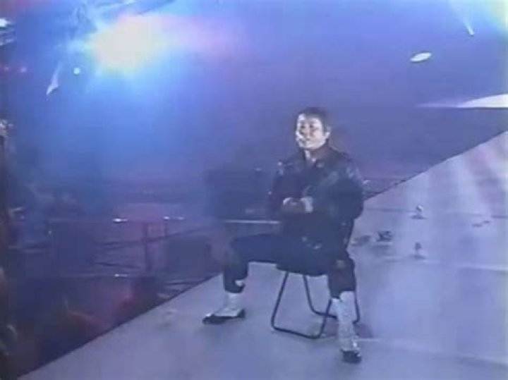 Atsushi Onita smokes on the NJPW entrance ramp