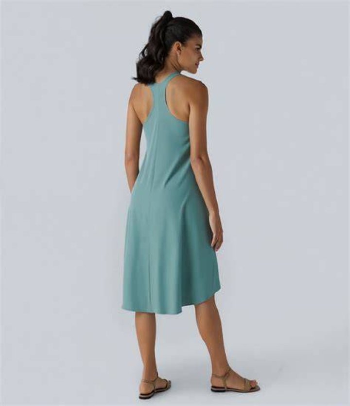 Backless sleeveless midi with spaghetti straps and two thigh-high slits