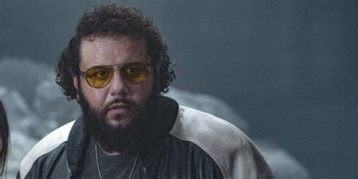 Black Adam Karim Mo Amer wearing sunglasses 