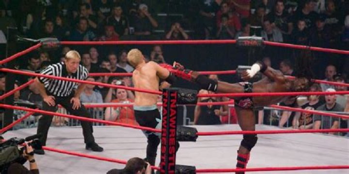 Booker T Kicks Christian Cage
