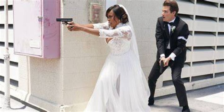 Brendon and Simone holding guns in The Rookie: Feds 