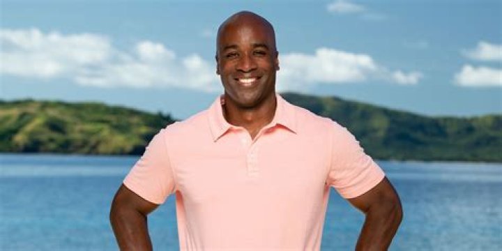 Bruce Perrealut Survivor 44 smiling near ocean