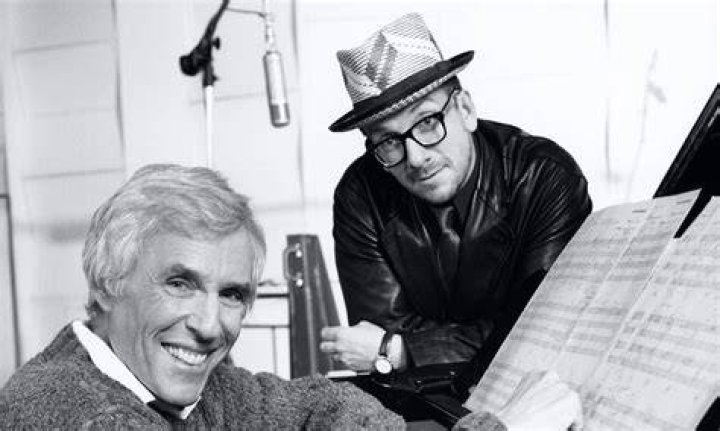Burt Bacharach, left, and Elvis Costello hold their awards for best pop collaboration with vocals with "I Still Have That Other Girl" during the 41st Annual Grammy Awards in Los Angeles in 1999. Photo / AP file