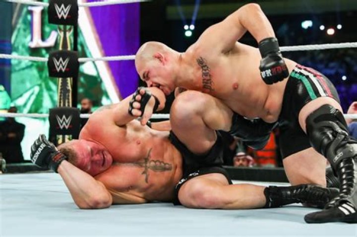 Cain Velasquez tackling Brock Lesnar