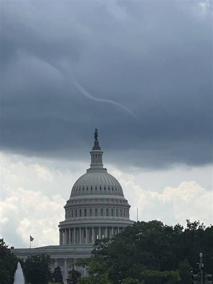Chance looks out on Washington DC in Being There 