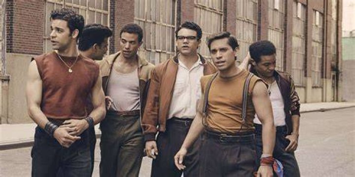 Chino walking with the Sharks in West Side Story.