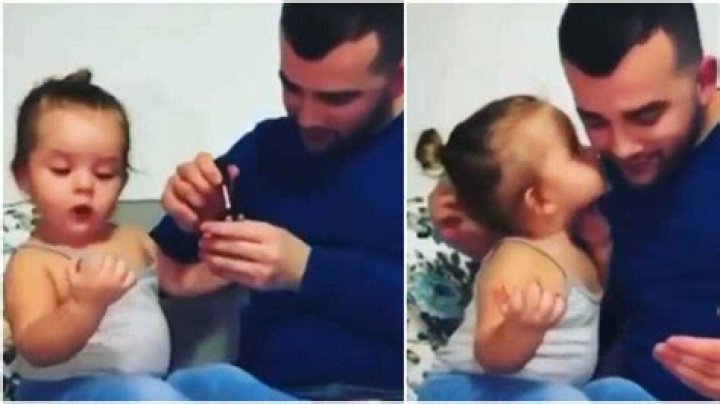 Cute Moment Little Girl Pecked her Dad after he Painted her Nails, Their Video Make Many Emotional