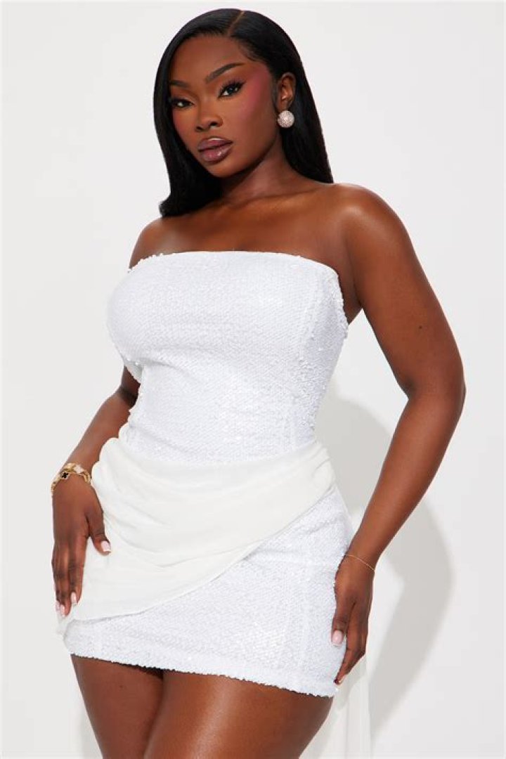 Cut-out white sequin mini with blouson sleeves and low V-neckline