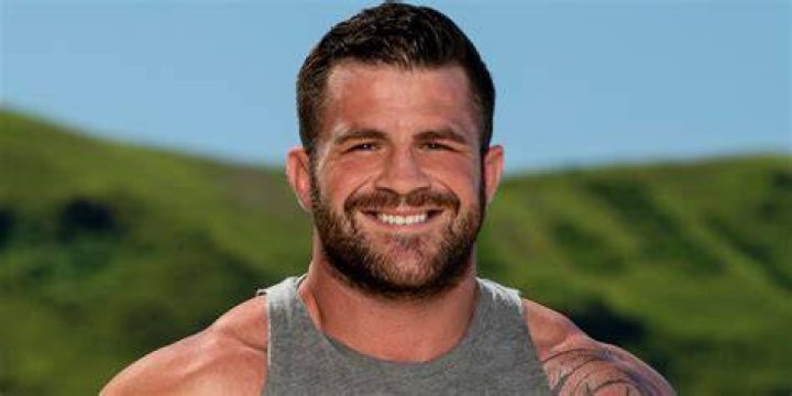 Danny Massa Survivor 44 close up smiling in grey tank top