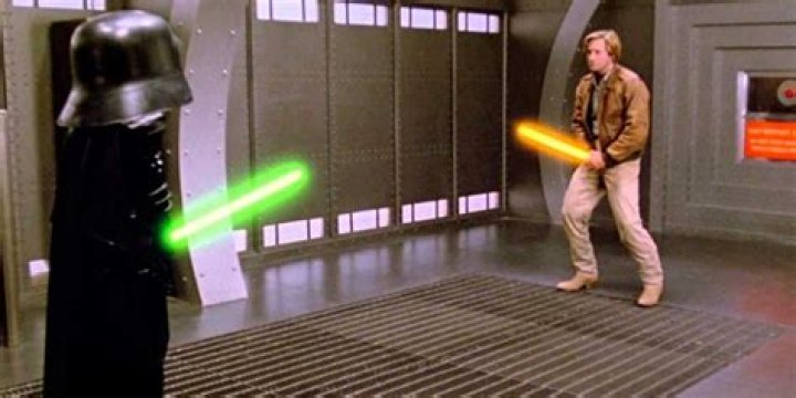 Dark Helmet and Lone Starr facing each other with their schwartzes in Spaceballs