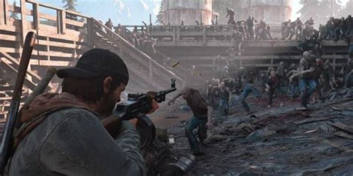 Deacon shoots the RPD at zombies in Days Gone.