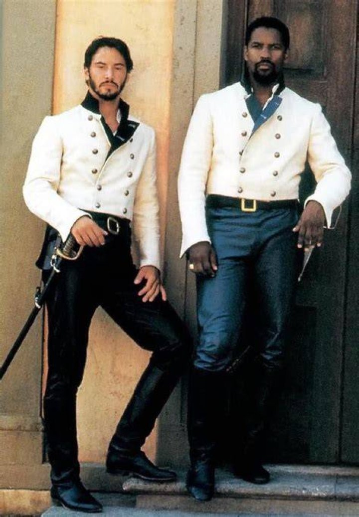 Denzel Washington and Keanu Reeves riding horses in Much Ado About Nothing