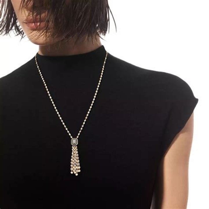 Diamond tassel mini with O-neck and asymmetric hemline