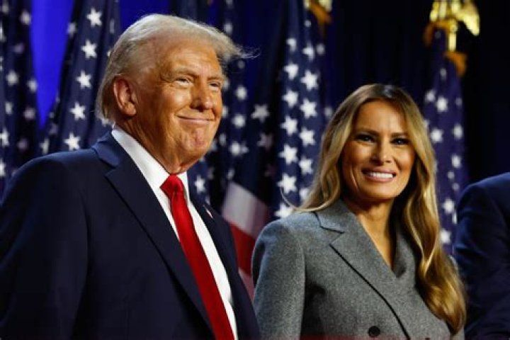 Donald Trump and first lady Melania Trump step off Air Force One at Andrews Air Force Base on December 31. Photo / AP