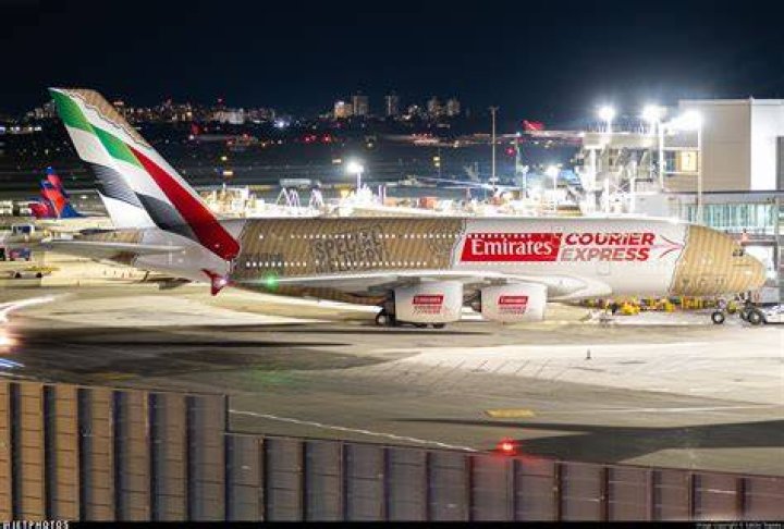 EK412 was greeted by waterjets after a late arrival to Christchurch Airport. Photo / Thomas Bywater