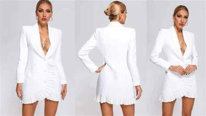 Elegant blazer dress with pleat detail along the hemline