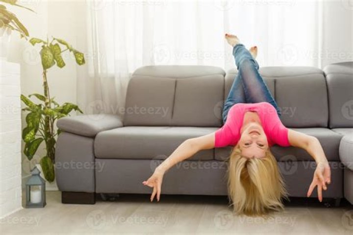 Elora sitting on a couch in Reservation Dogs