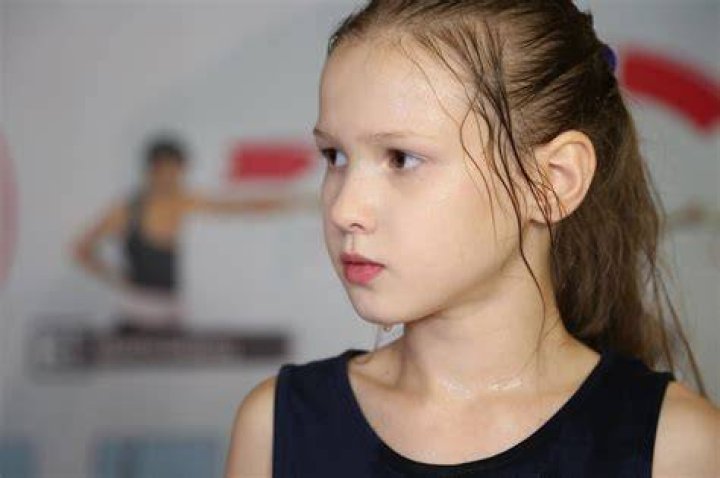 Evnika Saadvakass, 10yearold, punches a tree with her bare knuckles