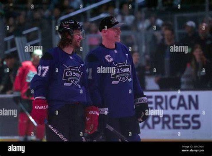 Former NHL player Mark Messier and wife Kim Clark attend the Samsung