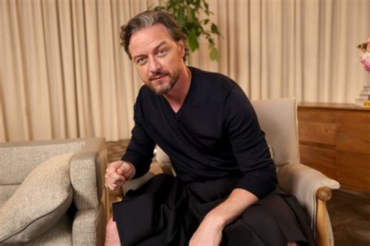 James McAvoy sitting in a car and wearing glasses in Split
