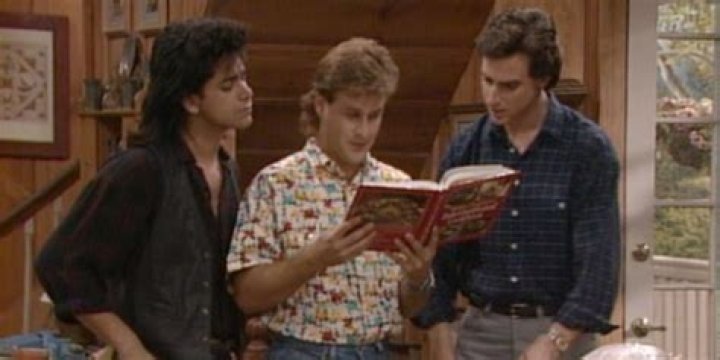 Jesee, Joey, and Danny looking a ta cook book in Full House