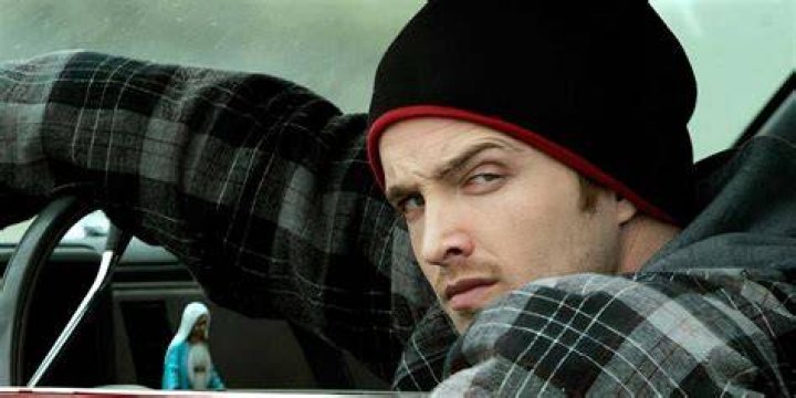 Jesse Pinkman standing in a field