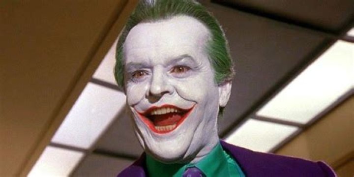 Joker torturing a henchman and dragging Batman to the cemetery in No&euml;l
