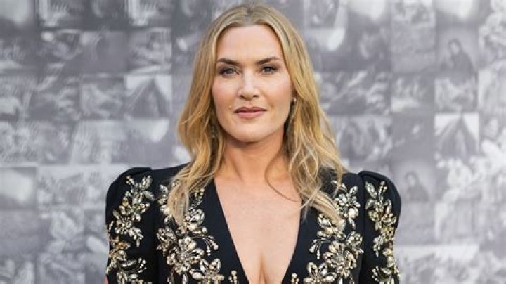Kate Winslet on the Mare poster and Mare rests her head on Lori's shoulder