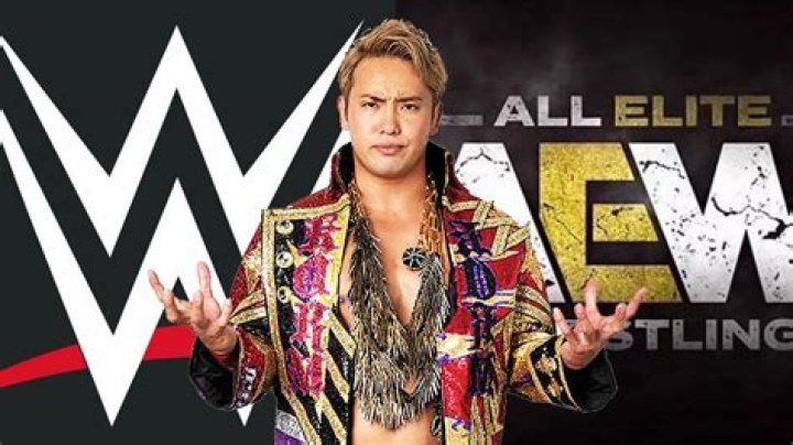 kazuchika okada in front of the wwe and aew logos