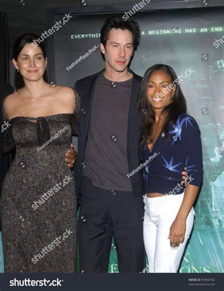 Keanu Reeves, Carrie-Anne Moss, Laurence Fishburne, and Joe Pantoliano in The Matrix