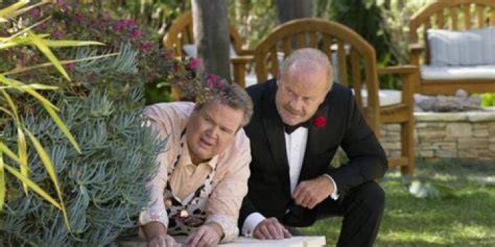 Keifth and Cam hiding in bushes on Modern Family
