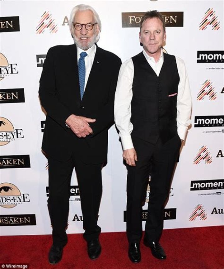 Kiefer Sutherland stands alongside his dad Donald at LA screening of
