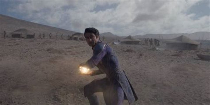 Kingo readying a cosmic blast in his hands in Eternals