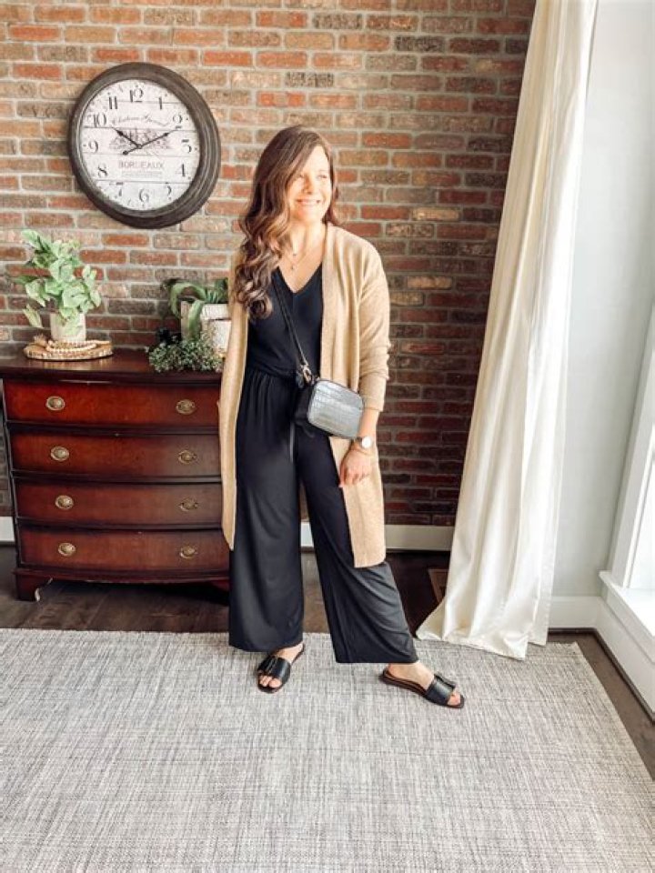 Long-sleeved collared romper with a long train and cutout detail