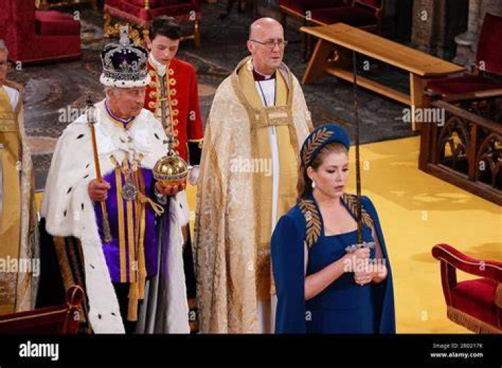Lord President of the Council, Penny Mordaunt, carrying the Sword of State, in the procession on May 6. Photo / Getty Images