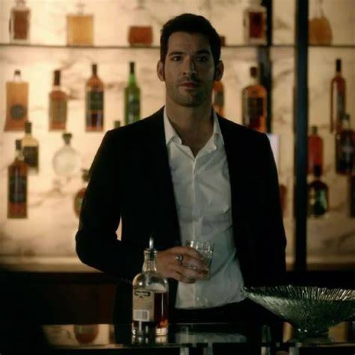 Lucifer in frotn of bar talking to in Lucifer