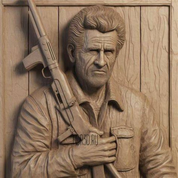 Mel Gibson with a gun in Dragged Across Concrete