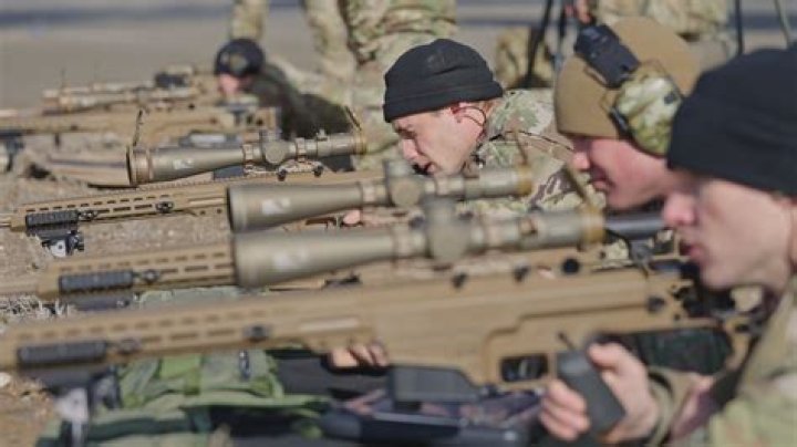 Mustafa using a sniper rifle in American Sniper