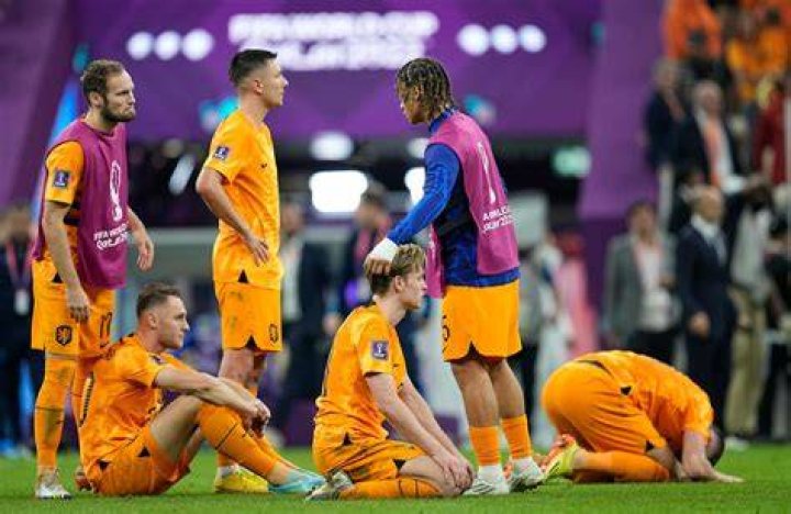 Netherlands players react after their penalty shootout defeat to Argentina. Photo / AP